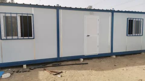 كرفان أبيض 3×9 بباب وشباكين حماية